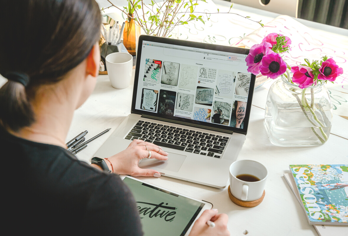 Photo Of Person Using Laptop For Graphic Designs 